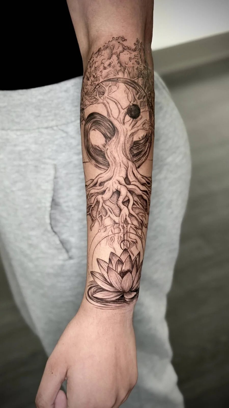 Ornamental spine tattoo